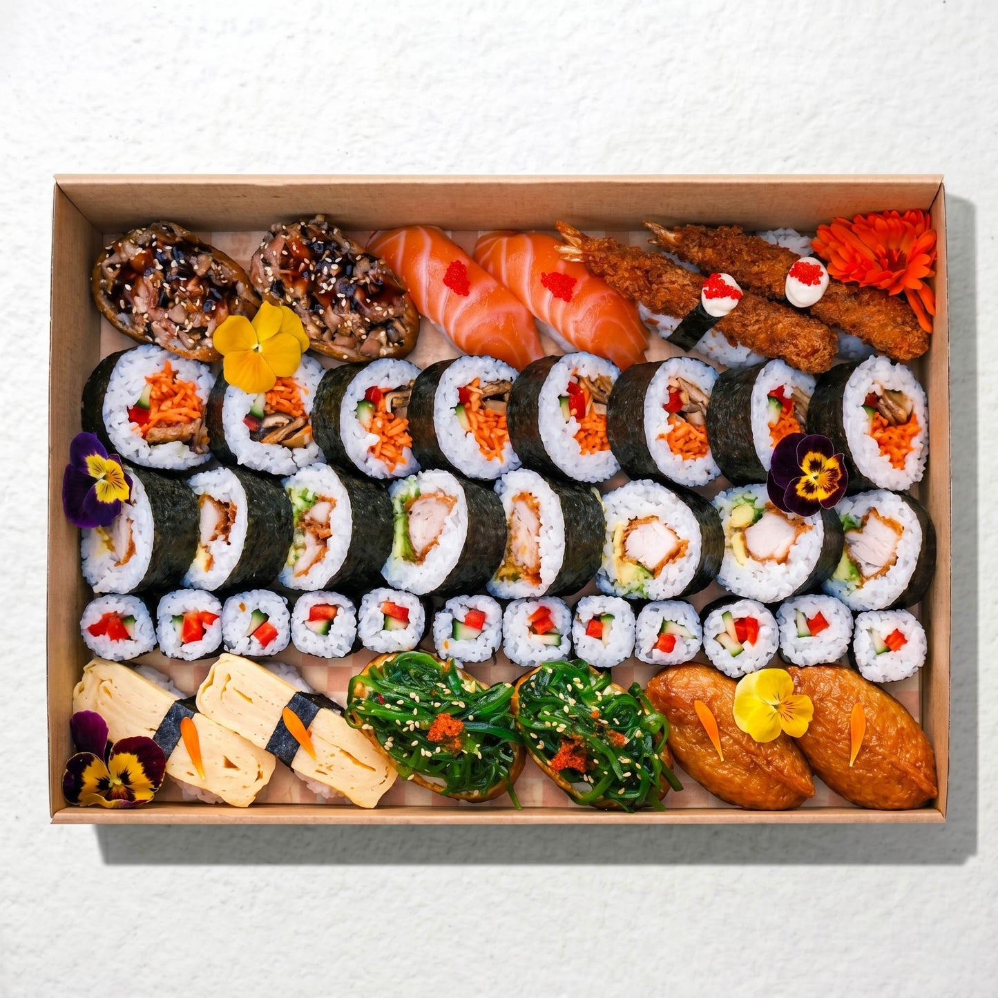 Mixed Sushi Platter from Double Dribble — chicken katsu, fresh salmon, prawn nigiri, tamago and vegetable rolls with seaweed salad, freshly made for sharing in a kraft catering box