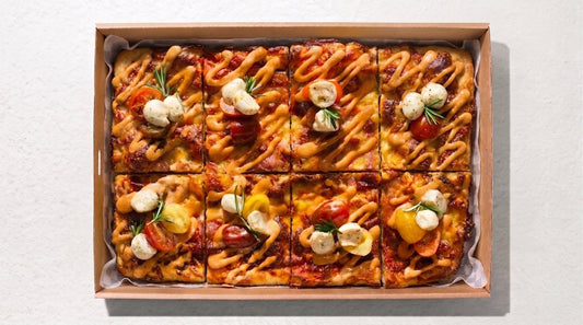 Focaccia Pizza Box (8pc) from Double Dribble — 8 golden focaccia pizza squares (900g dough) with meats, sauce & garnish, priced per piece — office lunch & party catering in Christchurch