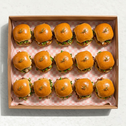 Mini Chicken Burger Box from Double Dribble — bite-sized crispy fried chicken sliders on soft Blue Moon milk buns in a kraft catering box