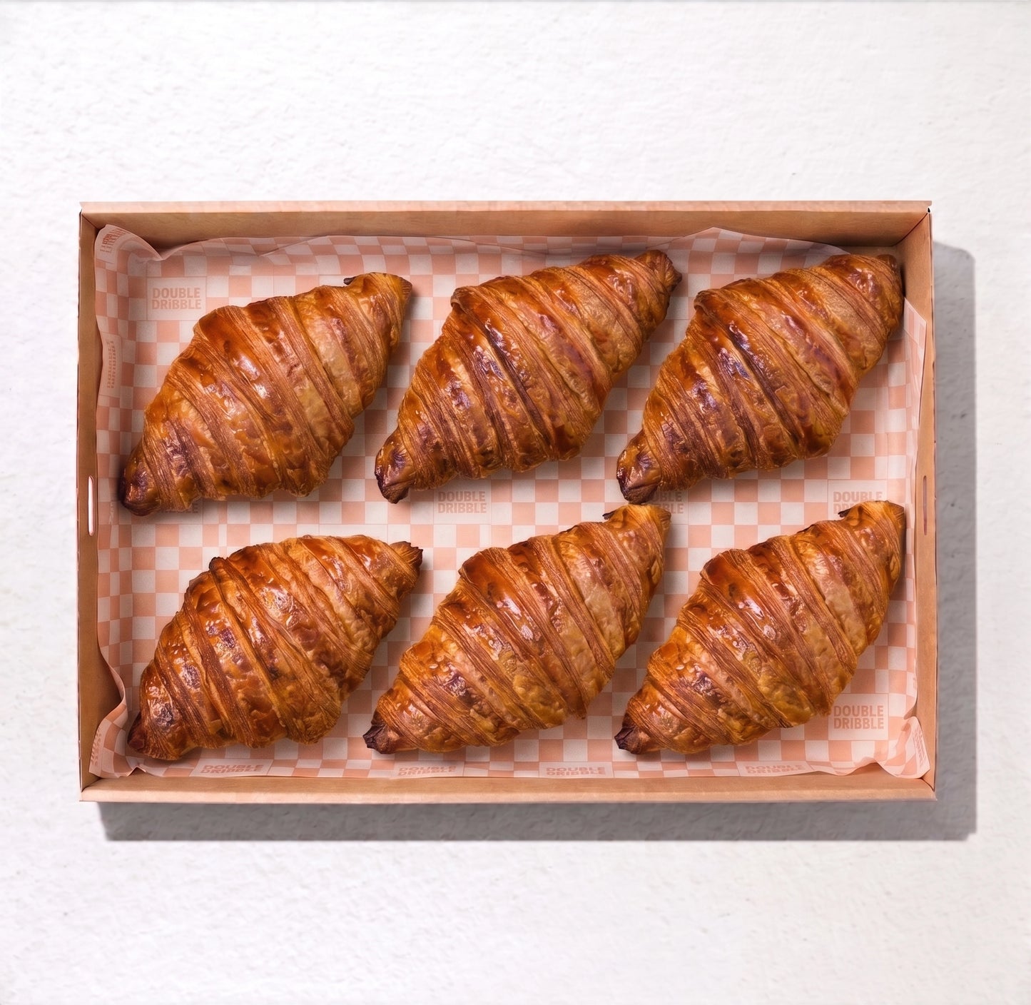 6 Blue Moon Croissants from Double Dribble — golden, all-butter croissants baked fresh (flavours vary) — office morning tea and student event catering in Christchurch